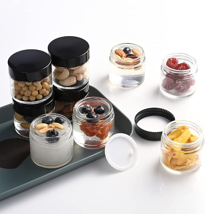 2 oz Round Clear Glass Jars, Bumobum 70 pack Cream Jars with Black Lids, Black and White Labels & Inner Liners, Empty Cosmetic Containers for Cream, Lotion